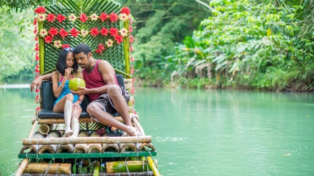 Bamboo rafting along a Jamaican river