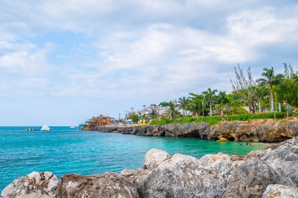 Rocky coastline and Caribbean water in Negril, Jamaica