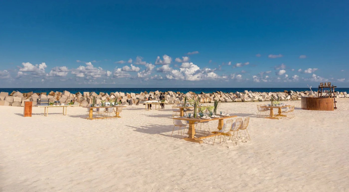 A beach wedding reception set for an intimate celebration in Mexico